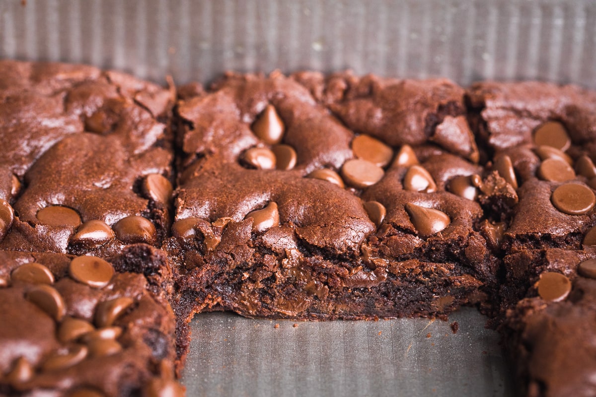 close up photo of inside of brownies in a baking dish.