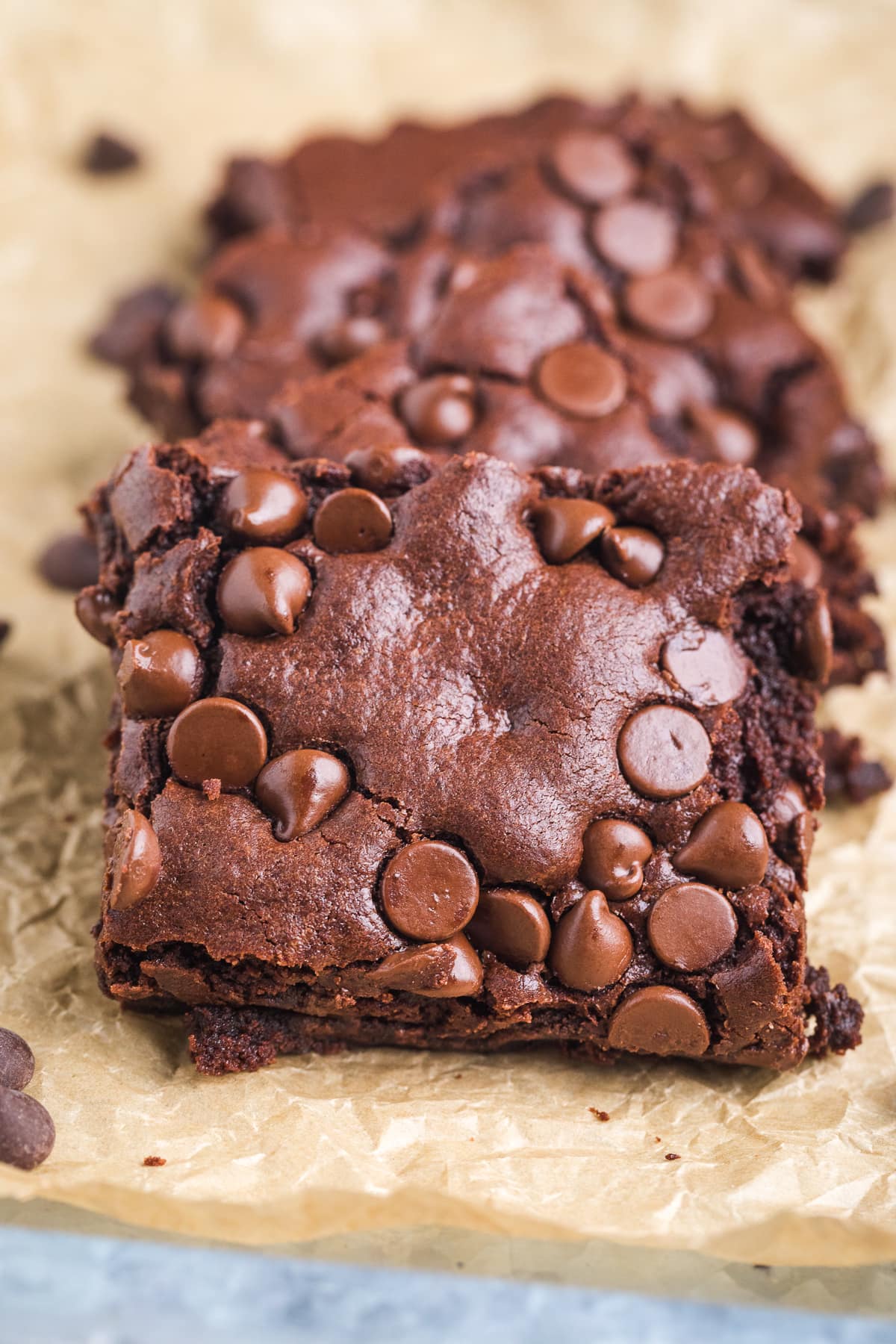 brownies from scratch on a tray styled on top of each other in a row.