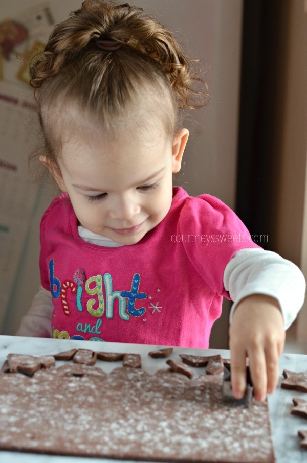 Chocolate Star Cookies with Cream Cheese Frosting and Candy Cane Dust