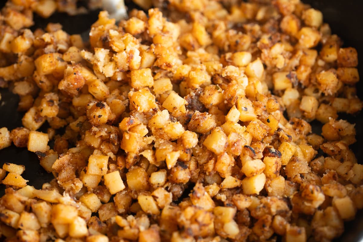 close up of homemade home fries in a skillet.