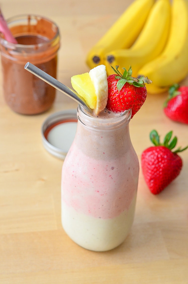 Healthy Banana Split Smoothie that you could easily enjoy for breakfast! Fun twist on the traditional dessert. 