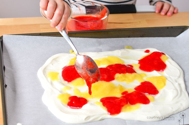 Banana Split Frozen Yogurt Bark, a refreshing frozen dessert for the whole family to enjoy. Using whole milk greek yogurt and fresh produce! Get this kid friendly recipe on www.courtneyssweets.com now for Mini Chef Mondays !