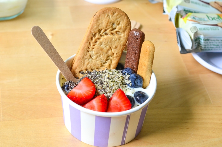 Easy Breakfast Party - Well balanced breakfast. Yogurt Bowls with fresh fruit, breakfast biscuits, dippers, cucumber lemon water and gifts to go!