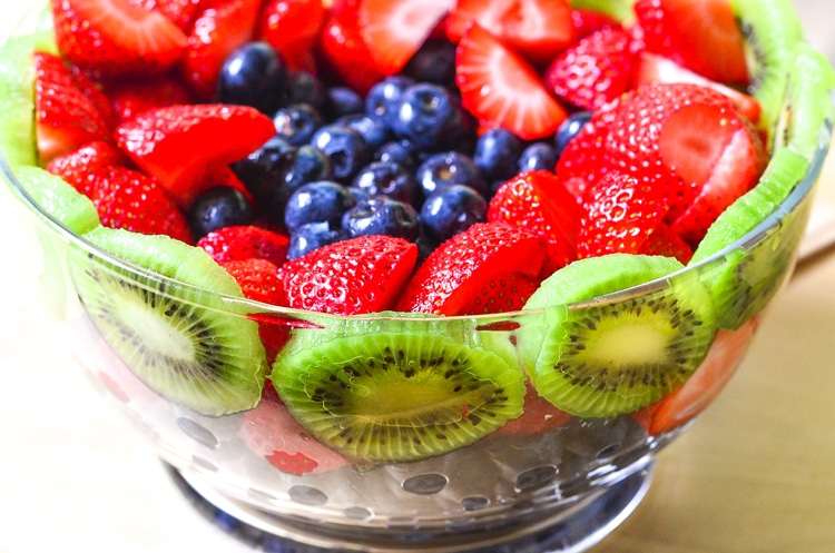 Easy Breakfast Party - Well balanced breakfast. Yogurt Bowls with fresh fruit, breakfast biscuits, dippers, cucumber lemon water and gifts to go!