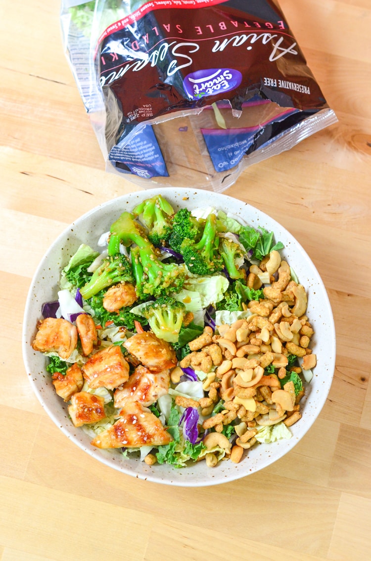 Asian Sesame Chicken Salad - a quick healthy a simple recipe for the entire family to enjoy. Filling meal and full of nuts, chicken, broccoli and beautiful, nutritious greens!