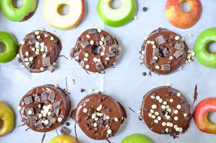 Try our delicious and healthy no bake fall treat; chocolate covered apple donuts! Freshly picked crisp apples that we covered in triple chocolate. It's a fun, healthy snack for the fall season when you pick apples. Serve to guests and wow them for sure, plus it's easy for your mini chef to help make them. :) They're a great vegetarian option so everyone can enjoy. You could even make them raw vegan treats if you choose vegan toppings.