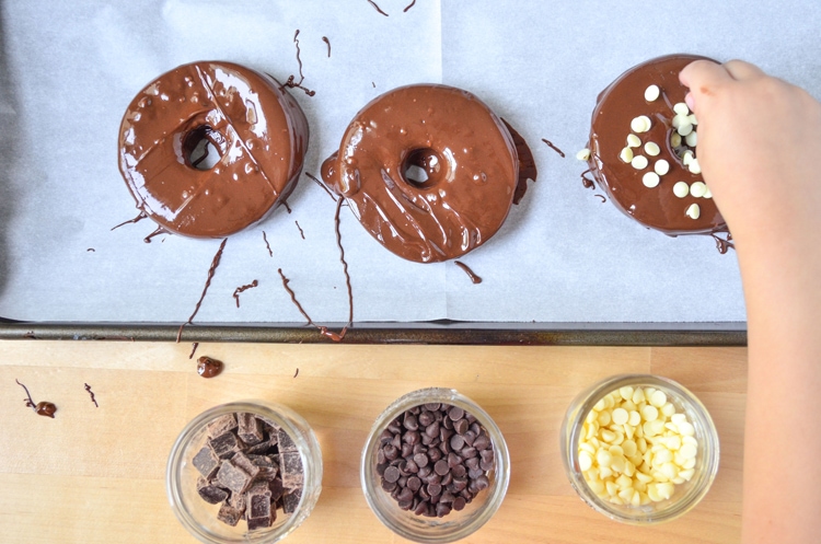 Try our delicious and healthy no bake fall treat; chocolate covered apple donuts! Freshly picked crisp apples that we covered in triple chocolate. It's a fun, healthy snack for the fall season when you pick apples. Serve to guests and wow them for sure, plus it's easy for your mini chef to help make them. :) They're a great vegetarian option so everyone can enjoy. You could even make them raw vegan treats if you choose vegan toppings.