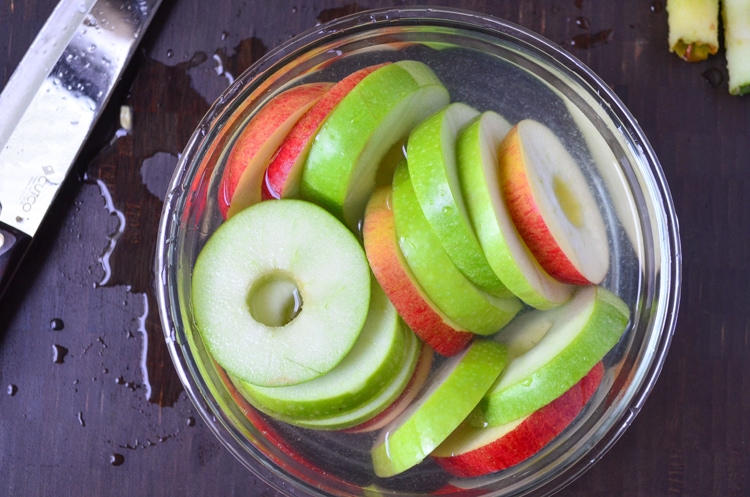 Try our delicious and healthy no bake fall treat; chocolate covered apple donuts! Freshly picked crisp apples that we covered in triple chocolate. It's a fun, healthy snack for the fall season when you pick apples. Serve to guests and wow them for sure, plus it's easy for your mini chef to help make them. :) They're a great vegetarian option so everyone can enjoy. You could even make them raw vegan treats if you choose vegan toppings.