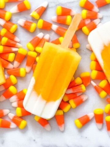 Our Candy Corn Ice Pops on Mini Chef Mondays make a delicious fall treat, especially for Halloween entertaining. We make ice pops regularly and this is a combination of my daughter's favorites! We use fresh fruit and yogurt for the layers. Healthy whole food ingredients for a nutritious dessert.