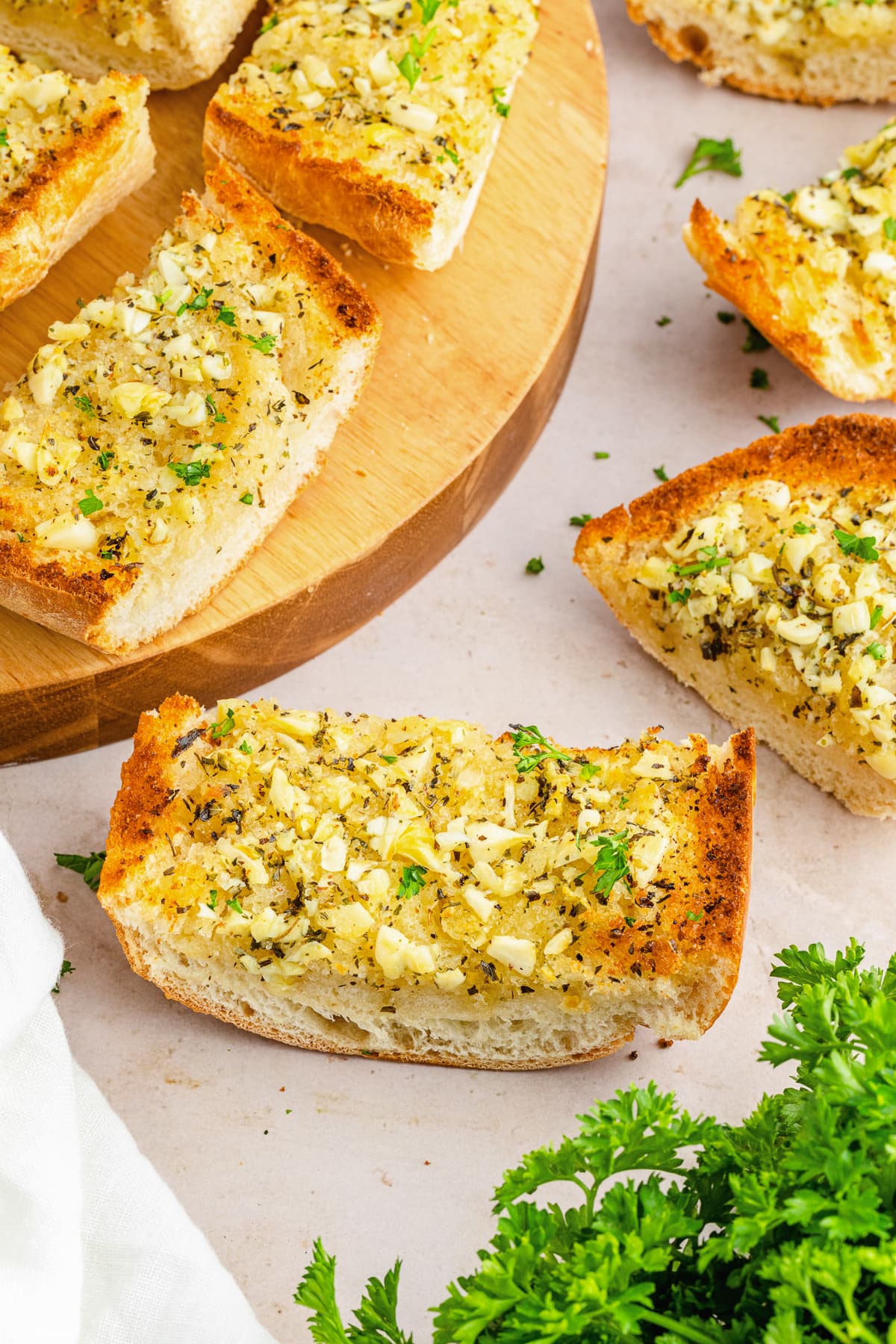 garlic bread sliced and scattered around.