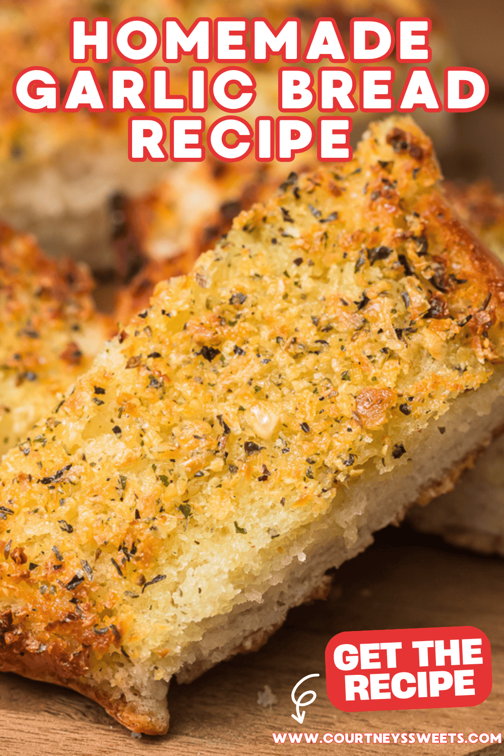 slices of garlic bread on a cutting board.