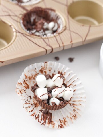 These chocolate hot cocoa cupcakes are a great way to make hot cocoa even and delicious. Great after a snow storm!