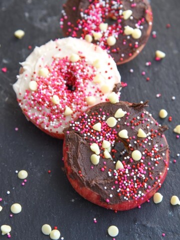 Mini Chef Mondays Easy Apple Donut Recipe for kids! Easy healthy snack using sprinkles for your favorite no bake holiday treats.