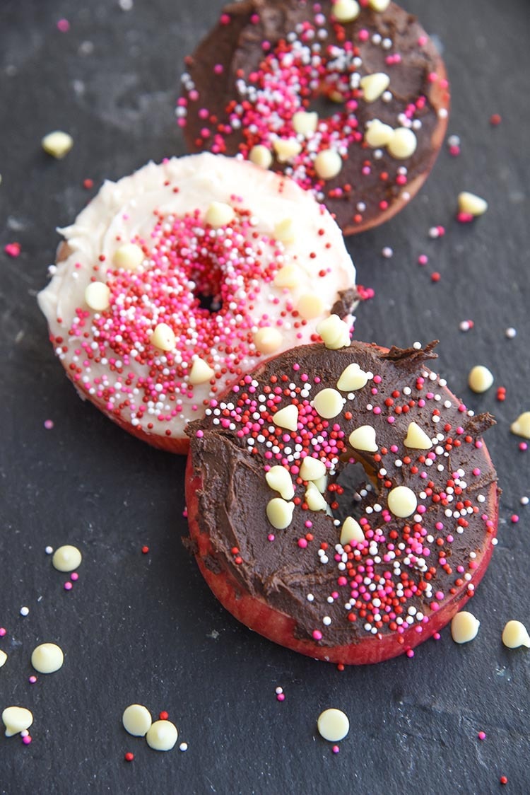 Mini Chef Mondays Easy Apple Donut Recipe for kids! Easy healthy snack using sprinkles for your favorite no bake holiday treats. 