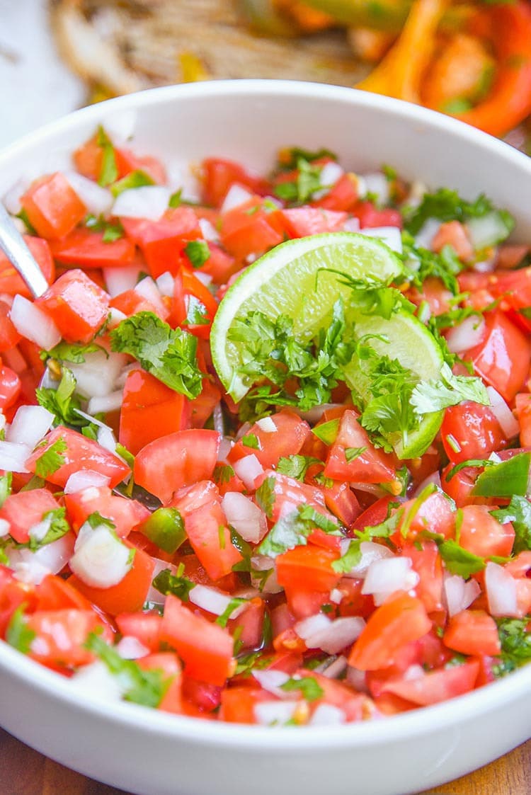 Authentic Pico de Gallo Recipe - By far the best pico de gallo recipe we've made. A fresh Salsa Fresca recipe for tacos, fajitas, and even with chips with fresh pico. (aka salsa with fresh tomatoes)