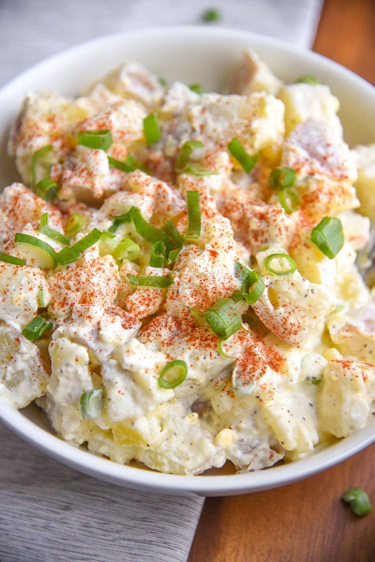 Quick and easy Potato Salad with Eggs Recipe is a great summer side dish for parties! Comfort food that is a family favorite for many!