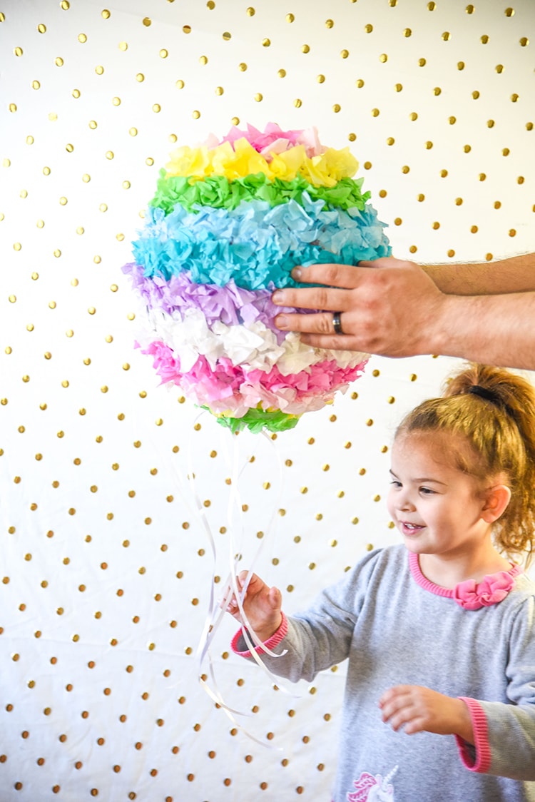 Have fun creating this DIY Pinata Easter Egg for a kid friendly Easter craft with your kids! This is a great DIY home tutorial or even a fun classroom activity.