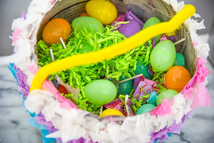 Have fun creating this DIY Pinata Easter Egg for a kid friendly Easter craft with your kids! This is a great DIY home tutorial or even a fun classroom activity.