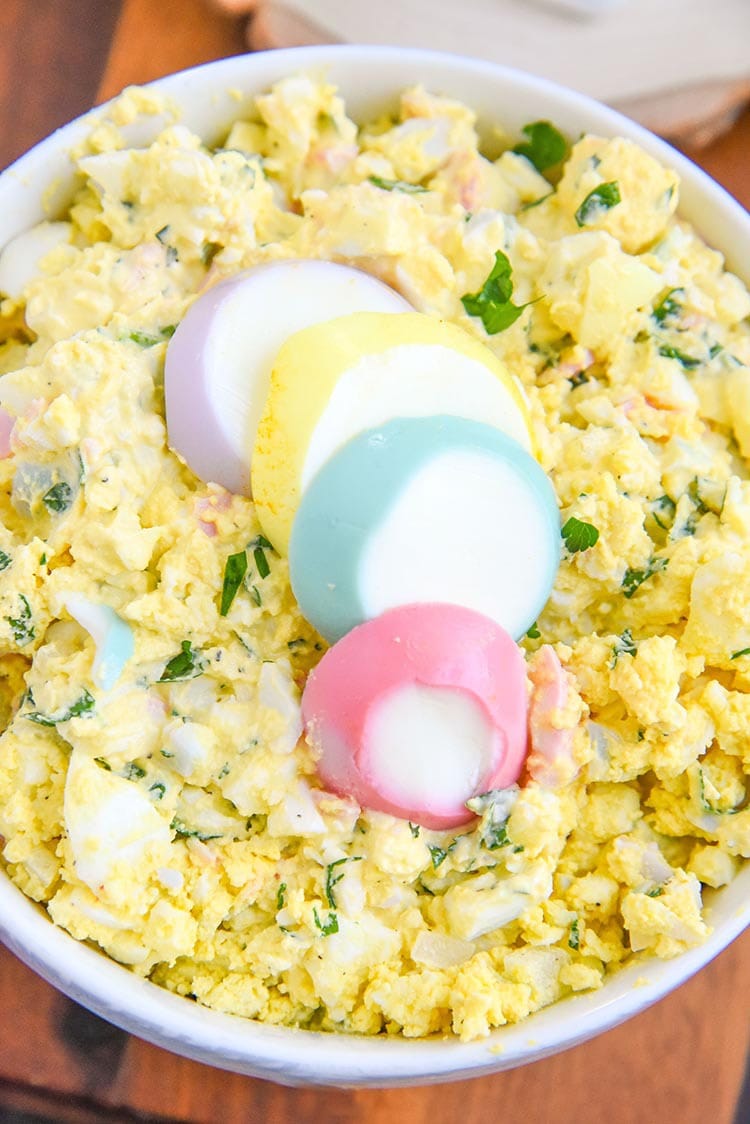 This simple egg salad recipe is a kid friendly recipe that the whole family will enjoy. We use our steamed hard boiled eggs and our homemade Easter egg dye to make it colorful and fun! close up