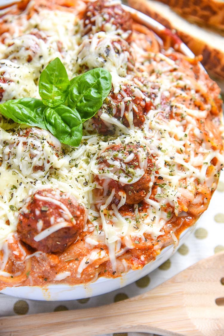 Baked Spaghetti and Meatballs is an easy dinner recipe of Italian Meatballs with Homemade Marinara Sauce, Pasta, Italian Cheese, and Spice.