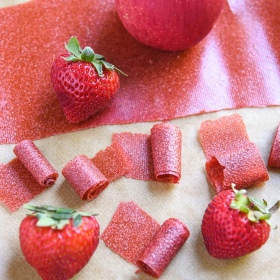 Childhood favorite Homemade Fruit Leather Recipe! Organic applesauce, organic strawberries are all you need for this Strawberry Apple Fruit Leather Recipe.