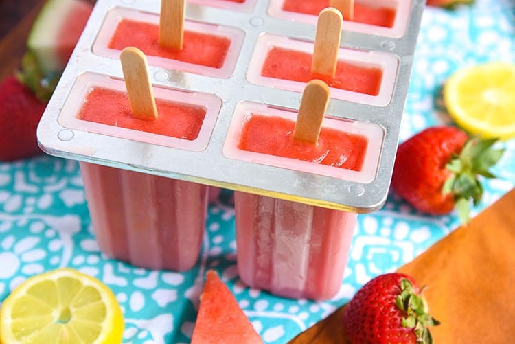 Nutritious Strawberry Watermelon Popsicles make for healthy and refreshing frozen summer dessert for kids! Easy to make recipe for kids on to Mini Chef Mondays and perfect to hydrate them on a hot summer day.