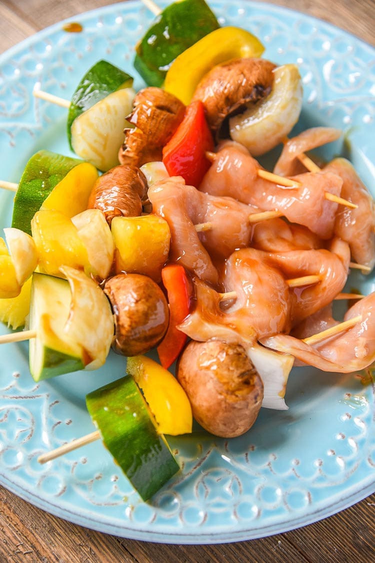 Teriyaki Chicken Kabobs with veggies and our secret weapon chicken kabob marinade. This kabob recipe is great for kids and adults! Ready for the grill!