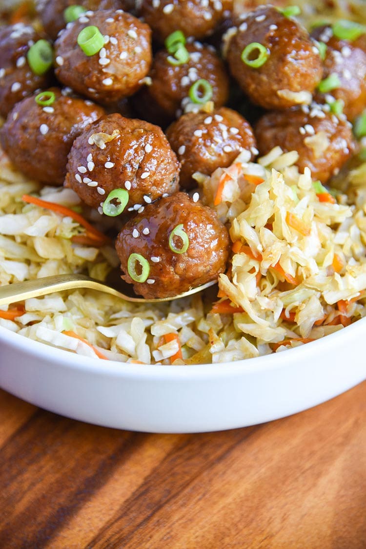 Korean Style BBQ Meatballs with Warm Coleslaw will be a new family favorite meal. Quick and Easy Dinner Recipe (less than 30 minutes!) (plated)