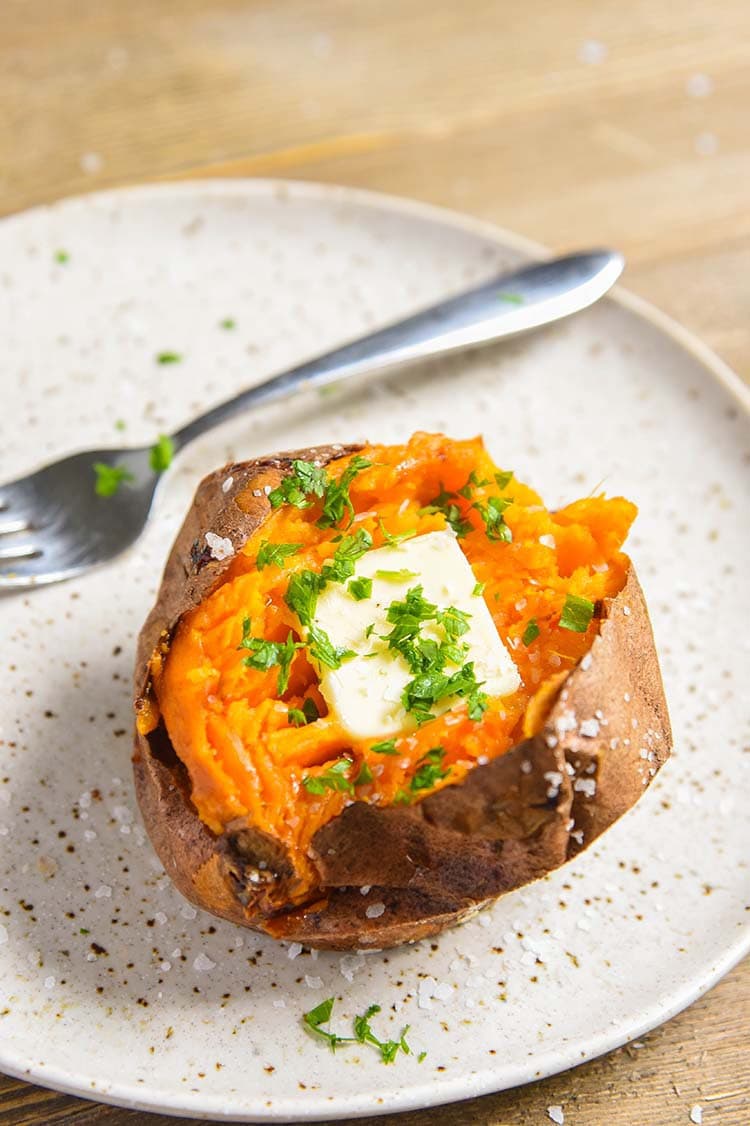 Our Air Fryer Baked Sweet Potato recipe results in a sweet potato baked to perfection, great side dish recipe.