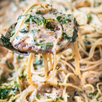 smothered pork chops with spinach spaghetti