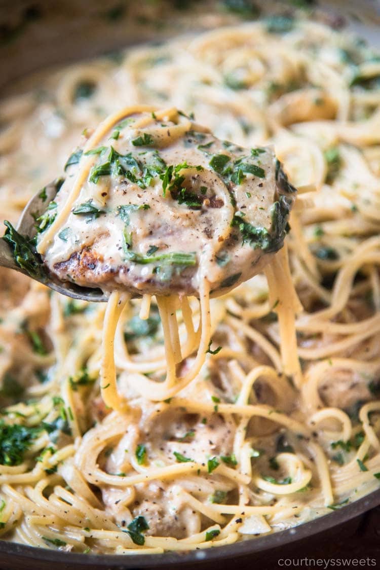 smothered pork chops with pasta and spinach
