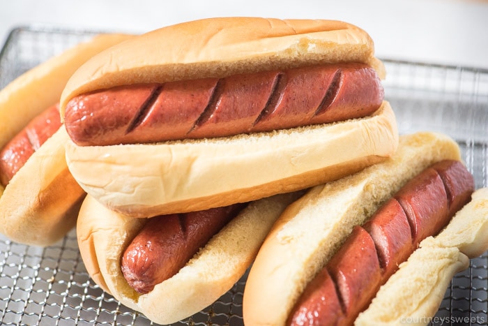 hot dogs cooked from the air fryer on the tray