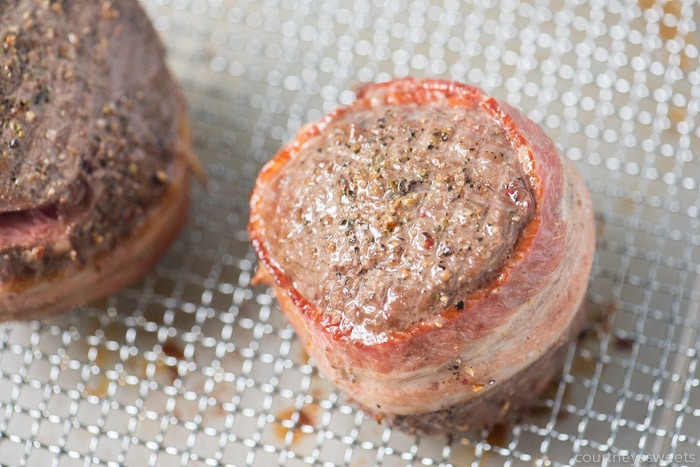 This bacon wrapped filet mignon will wow your dinner guests. Nicely seared on the outside with a beautiful pink inside on this air fryer filet mignon with bacon! air fryer filet mignon