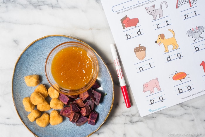 chicken nuggets with sweet and sour sauce dip homework on marble pastry board