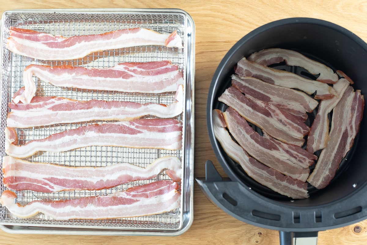 comparison photo of raw bacon in cuisinart air fryer basket and ninja air fryer basket.