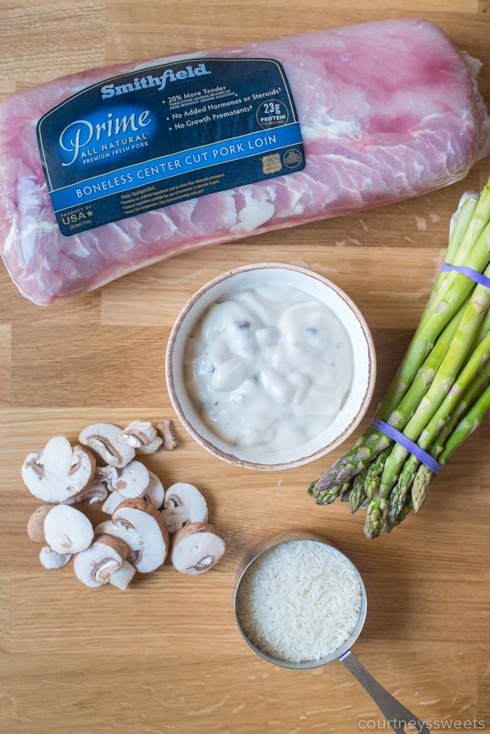 pork loin mushrooms rice cream of mushroom soup and asparagus for baked pork chops and rice on a table