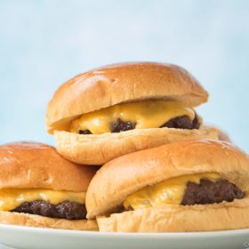 air fryer cheeseburgers on a plate