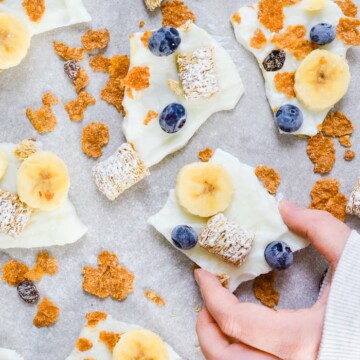 holding frozen yogurt bark breakfast cereal