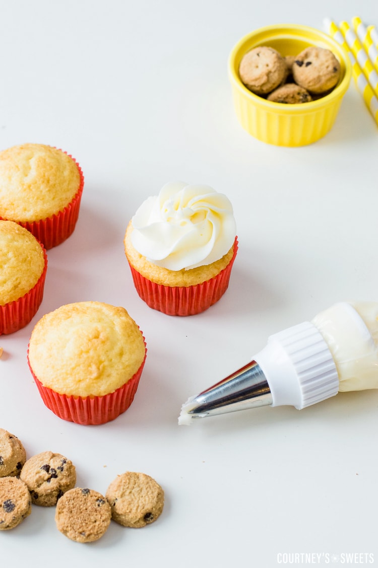 piping frosting onto cake mix cupcakes