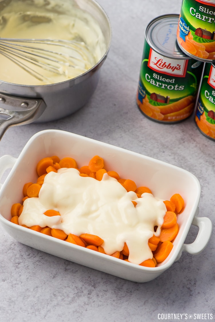 canned carrots with cheese sauce in a casserole dish