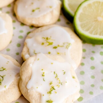 key lime cookies on a napkin with lime slices