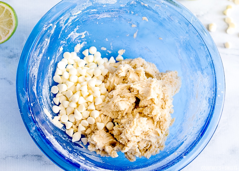 key lime cookie dough with white chocolate chips in a bowl