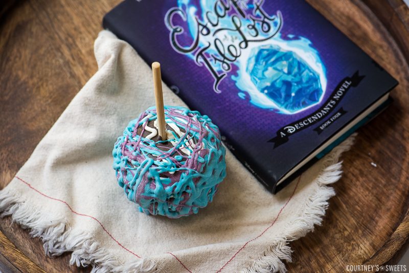 how to make Chocolate Covered Apples Inspired by Disney Descendants chocolate covered apple with disney descendants book on napkin