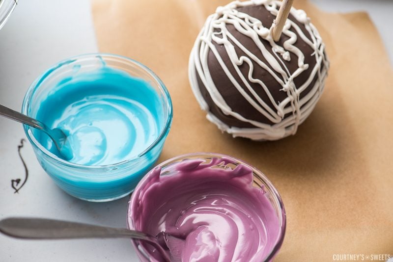 how to make Chocolate Covered Apples Inspired by Disney Descendants melted chocolate in bowls with chocolate covered apple