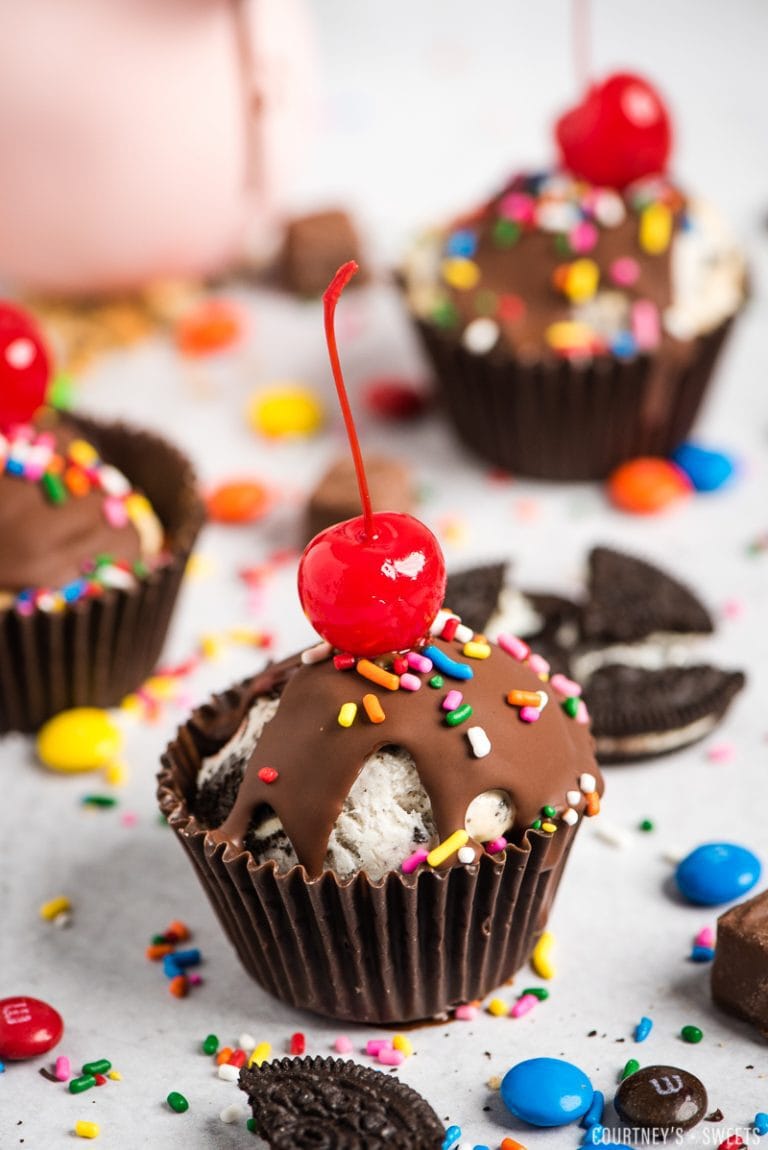 ice cream cupcakes with cherries on top