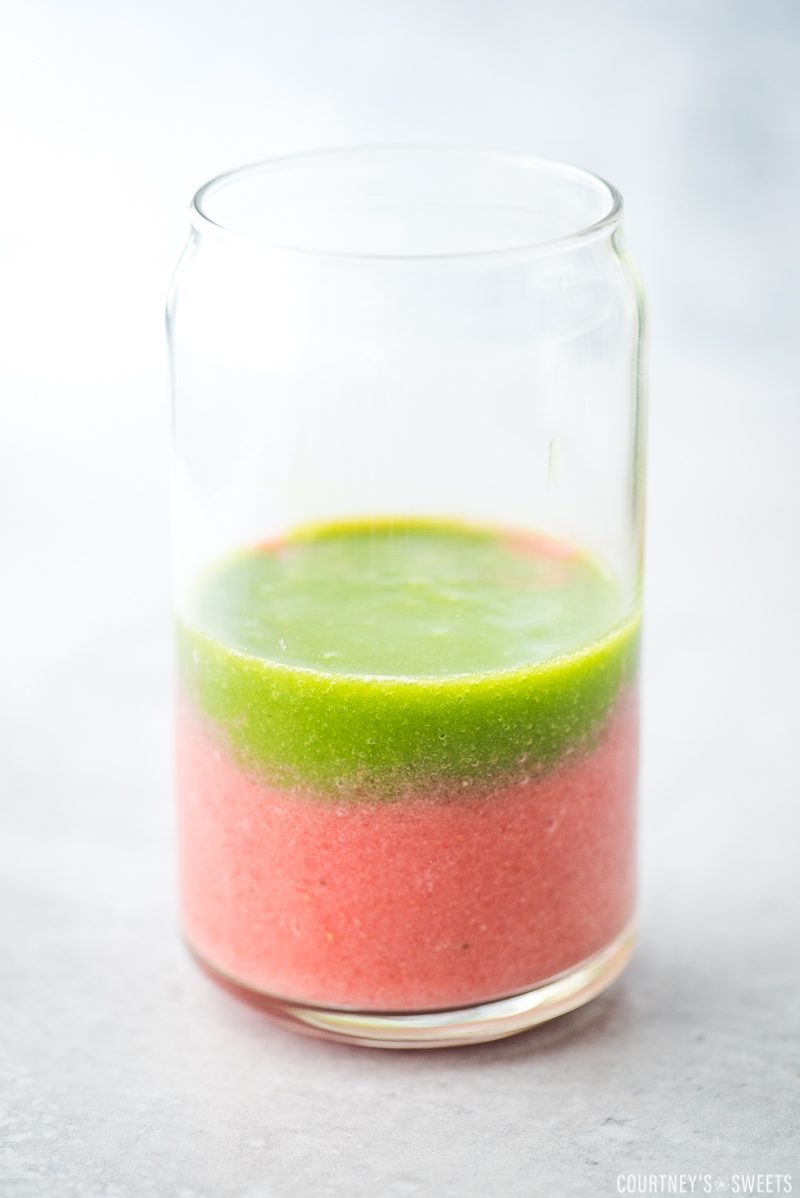 layered smoothie in a glass cup