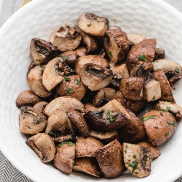 air fryer mushrooms with balsamic vinegar in a bowl