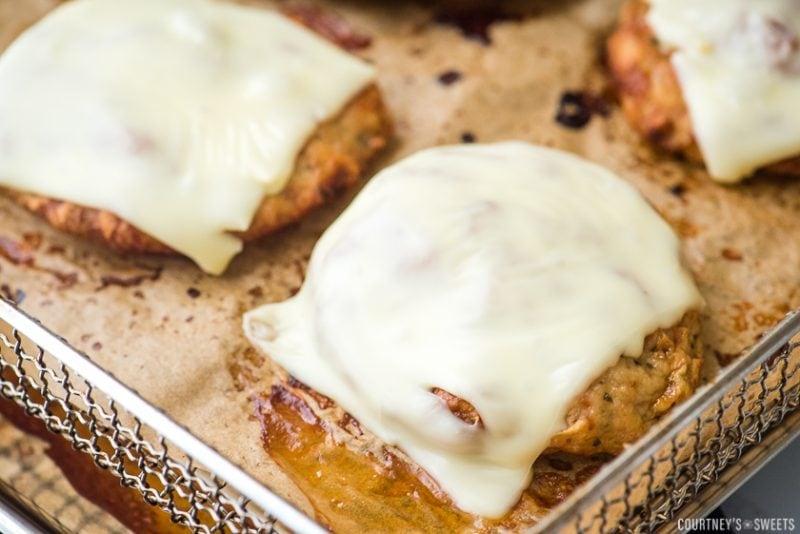 turkey burger on air fryer rack with melted american cheese