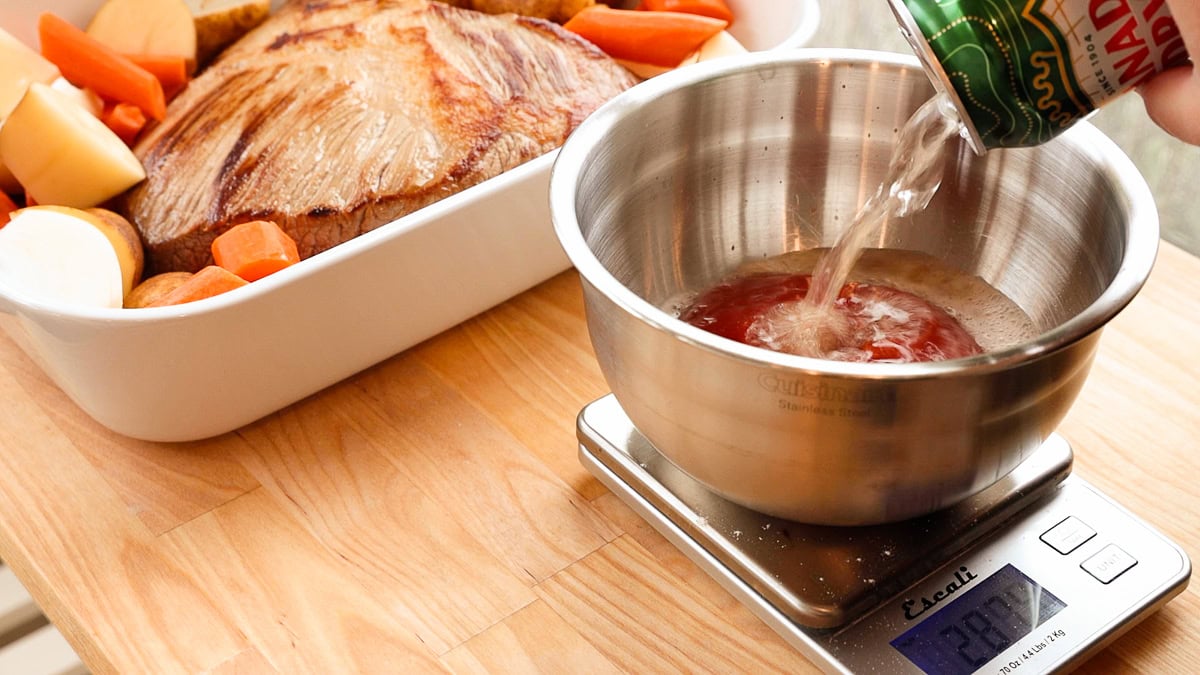 pouring gingerale into a bowl.