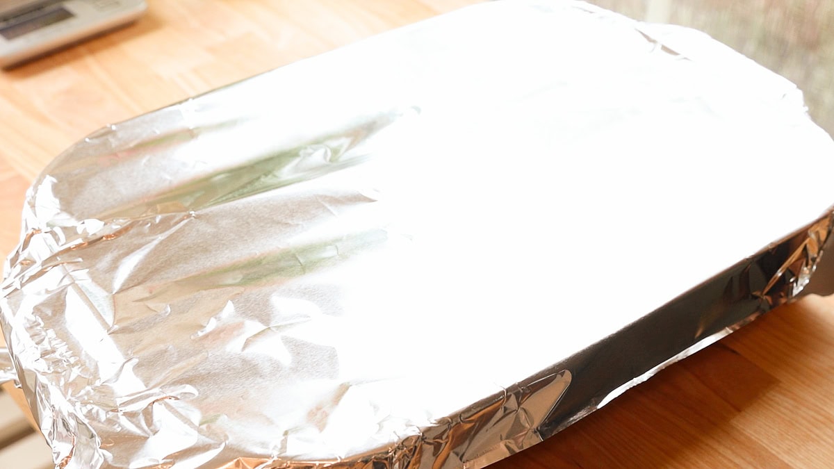 aluminum foil covering casserole dish.